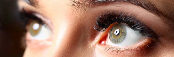 Amazing female green colored eyes with eyelashes extensions — Stock Photo, Image