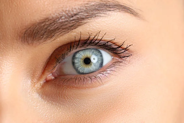 Amazing female blue and green colored eye — Stock Photo, Image