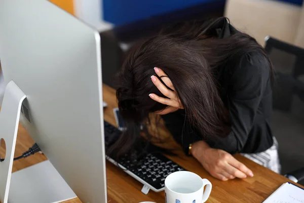 Overworked woman at workspace — Stock Photo, Image