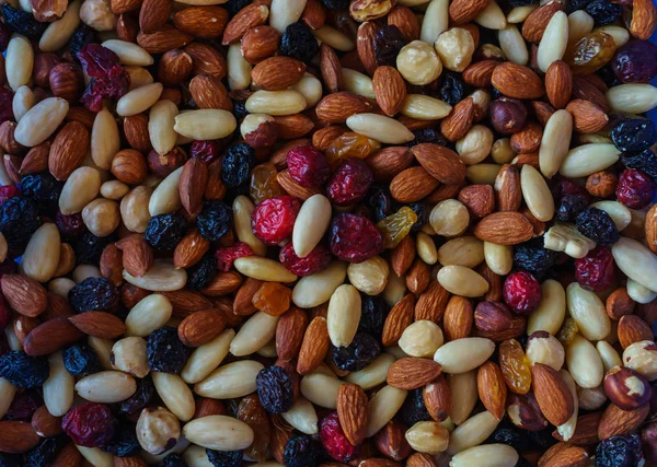 A healthy organic trail mix of almonds, raisins, cranberries, and other various nutrition