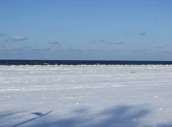 Endless expanses on a snow-covered beach in Jurmala, on the shore of the Gulf of Riga, in winter 2018.Latvia