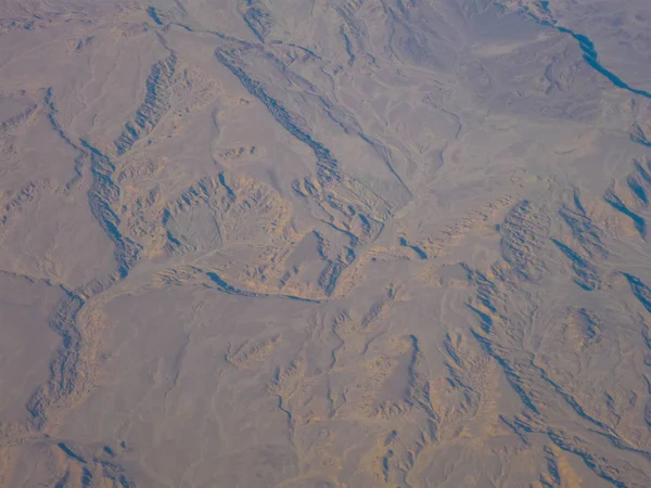 stock image View from the airplane window, flying up to Hurghada. Below the desert. July 2009.Egypt.