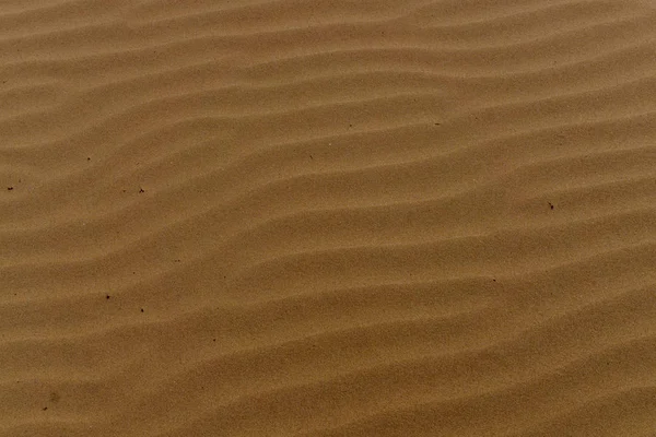Dibujo en la arena después de las olas —  Fotos de Stock
