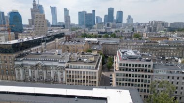 Warsaw from above  a dynamic city where modern skyscrapers rise beside historic streets, blending tradition and innovation in the heart of Poland.