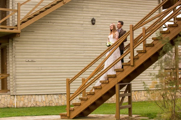 Beautiful Bride Handsome Groom Posing Wooden Stairs — Stock Photo, Image