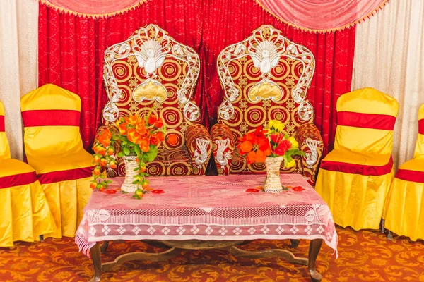 Wedding Stage for Bride and Bridegrooms  with Normal Decorations and Sofas.