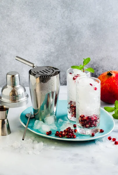 Refreshing Alcoholic Drink Lemon Pomegranate Seeds White Stone Table Gray — Stock Photo, Image