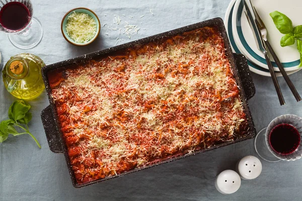 Vegan Lasagna Lentils Green Peas Baking Sheet Table Blue Linen — Stock Photo, Image