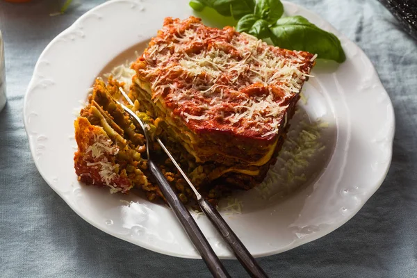 Vegan Lasagna Lentils Green Peas Baking Sheet Table Blue Linen — Stock Photo, Image