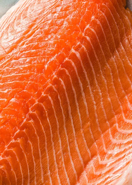 Fresh salmon slice very close up. macro shot. seafood background