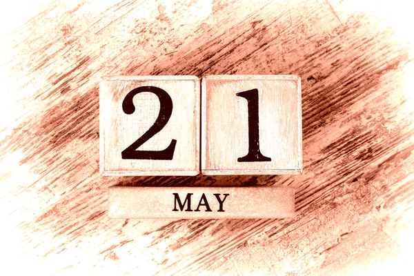 wooden calendar with date may, 21