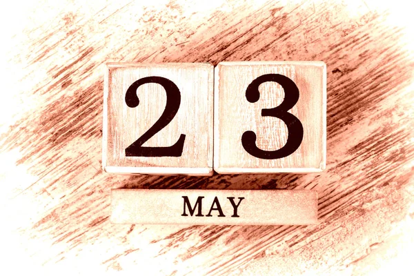 wooden calendar with date may, 23