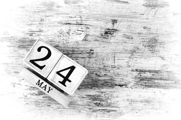 wooden calendar with date may, 24