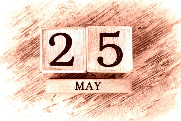 wooden calendar with date may, 25