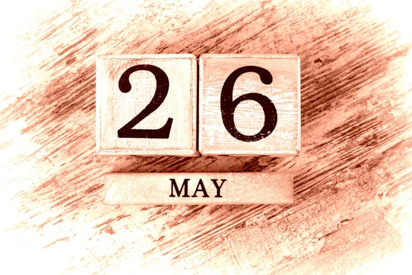 wooden calendar with date may, 26