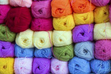 colorful threads for knitting as a background