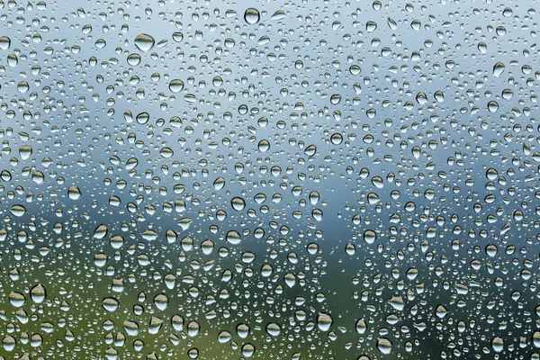 Gotas Lluvia Superficie Los Cristales Ventana Con Fondo Nublado — Foto de Stock