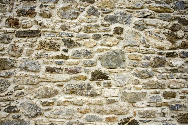 石造りの壁のテクスチャ写真の背景 — ストック写真
