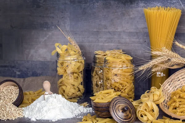 Raw food macaroni in kitchen. Food concept photo.