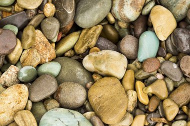 Arka plan çakıl taşları ile deniz doku taşlar.. 