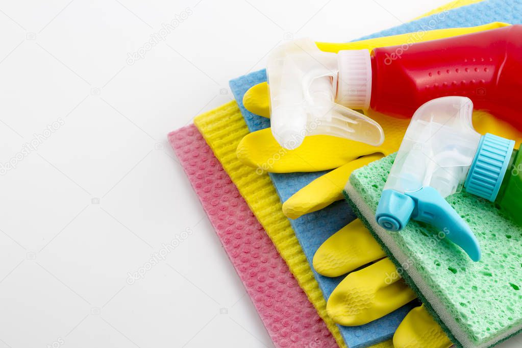 Cleaning products with cleaning material, isolated on white