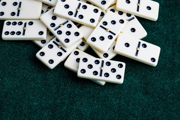 Falling dominoes. Domino effect. The domino game.