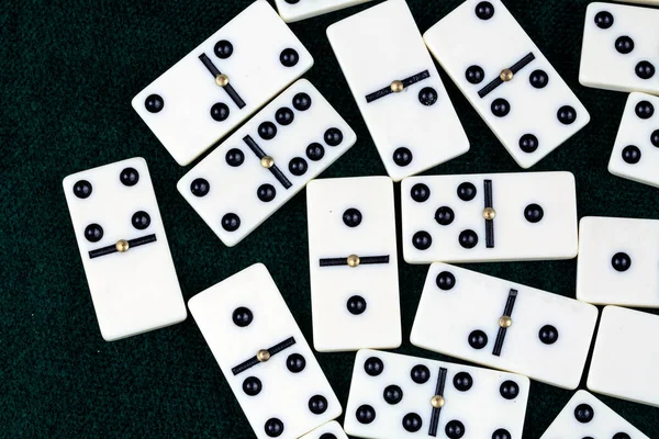 Falling dominoes. Domino effect. The domino game.