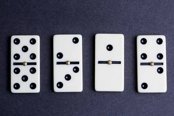 Falling dominoes. Domino effect. The domino game.