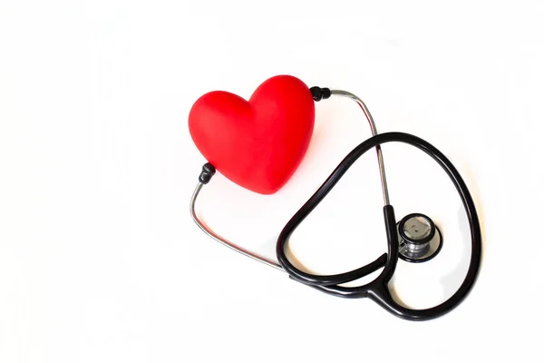 Stethoscope and red heart. Heart Check. Concept healthcare.