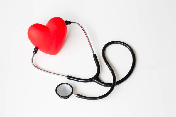 Stethoscope and red heart. Heart Check. Concept healthcare.