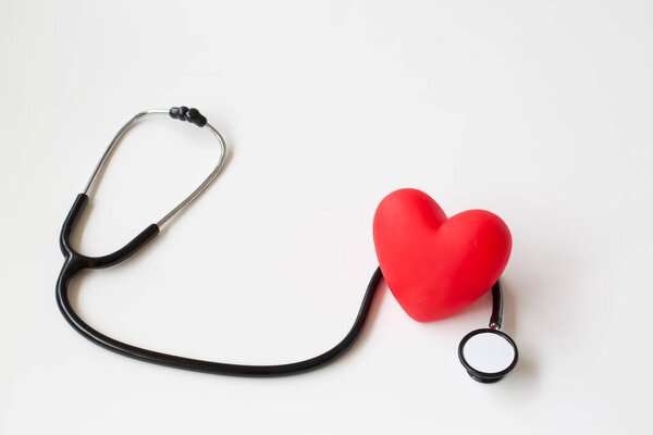 Stethoscope and red heart. Heart Check. Concept healthcare.