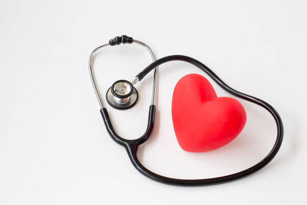 Stethoscope and red heart. Heart Check. Concept healthcare.