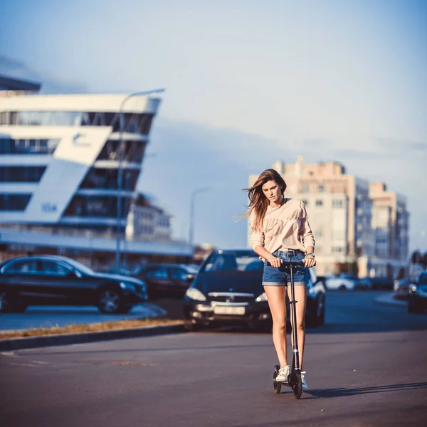 Beautiful Young Girl Denim Shorts Riding Electric Scooter Sunglasses Long Royalty Free Stock Images