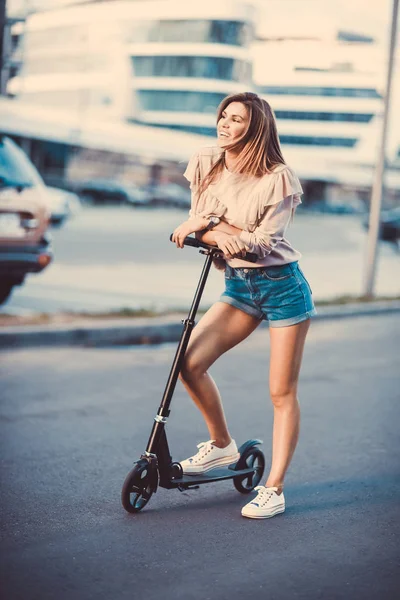Beautiful Young Girl Denim Shorts Riding Electric Scooter Sunglasses Long Stock Picture