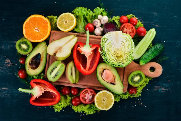 Cibo Sano Verdure Frutta Uno Sfondo Legno Nero Vista Dall — Foto Stock