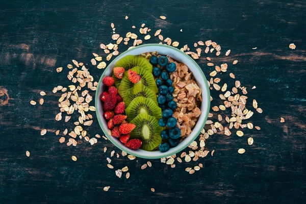 Oatmeal Blueberry Strawberries Kiwi Wooden Background Top View Free Space — Stock Photo, Image