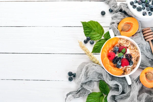 Oatmeal Apricots Blueberries Breakfast Wooden Background Top View Free Space — Stock Photo, Image