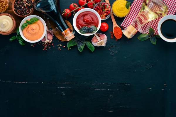 Set Sauces Black Wooden Background Ketchup Mayonnaise Mustard Soy Sauce — Stock Photo, Image