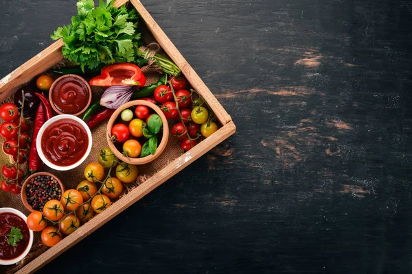 Assortment Tomato Sauces Wooden Box Ketchup Cherry Tomatoes Spices Chili — Stock Photo, Image