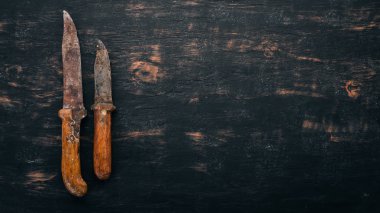 Eski bıçak mutfak eşyaları. Metin için özgür yer. Üstten görünüm.