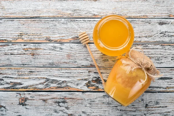 Honey Jar White Wooden Background Free Space Text Top View — Stock Photo, Image