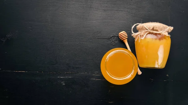 Honey Jar Black Wooden Background Free Space Text Top View — Stock Photo, Image