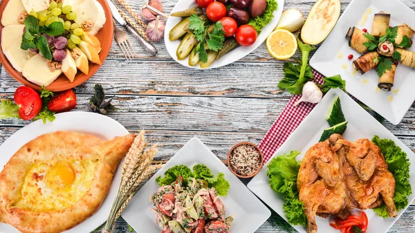 A set of food. Georgian cuisine. On a white wooden background. Free space for text. Top view. — Stock Image Set Food Georgian Cuisine White Wooden Background Free Space Text Royalty Free Stock Images