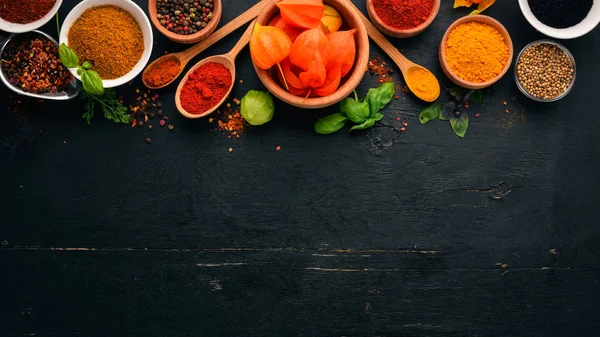 Spices Herbs Wooden Board Pepper Salt Paprika Basil Turmeric Black — Stock Photo, Image