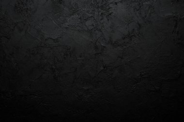Black stone background. Black surface. Top view. Free space for your text. clipart
