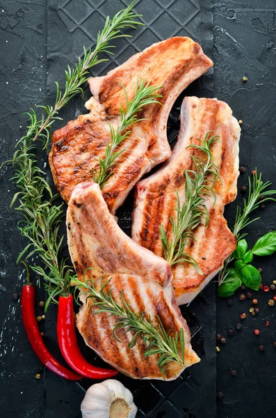 Steaks Bone Rosemary Grill Barbecue Black Stone Background Top View — Stock Photo, Image