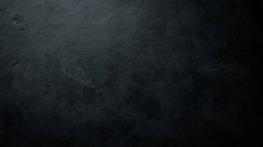Siyah taş arka plan. Üst görünüm. Ücretsiz kopya alanı.