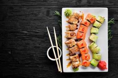 Set Sushi Roll. Chinese traditional dish. Top view. Free copy space.
