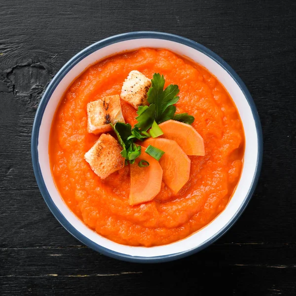 Carrot puree soup. with toast bread. Dietary food. Top view. Free copy space. — Stock Image Carrot Puree Soup Toast Bread Dietary Food Top View Free Stock Image