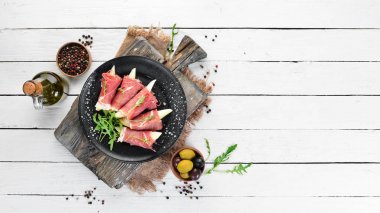 Armut ve arugula ile Prosciutto. Soğuk atıştırmalıklar. Üst te. Metniniz için boş alan.